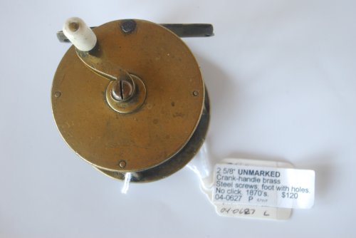 2 5/8 UNMARKED Curved crank-handle brass; Ivory knob; steel screws; No click. Brass foot with holes to secure reel. Circa 1870s. 9 3/8 oz.